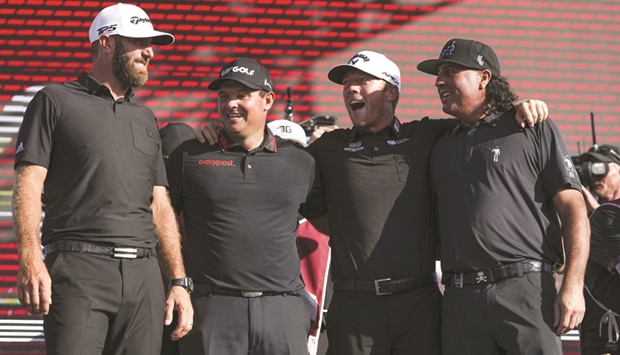 Team Captain Dustin Johnson, Talor Gooch, Patrick Reed and Pat Perez of Team 4 Aces GC on the podium after winning the team championship stroke-play round of the LIV Golf Invitational in Miami. (AFP)