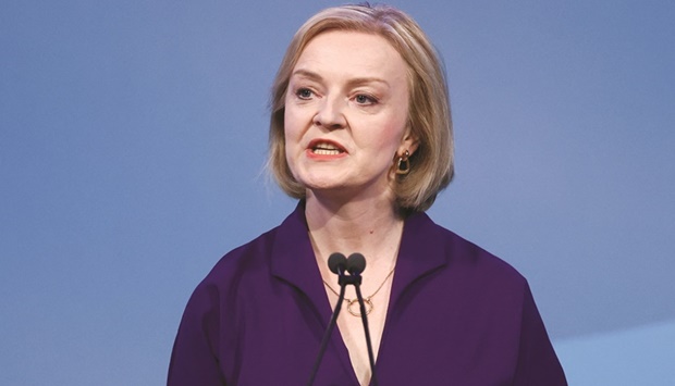 Liz Truss...abandons her governmentu2019s proposal to lower the tax rate paid by the countryu2019s highest earners.