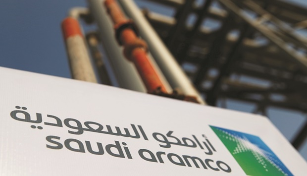 The Saudi Aramco logo is pictured at the oil facility in Abqaiq, Saudi Arabia.