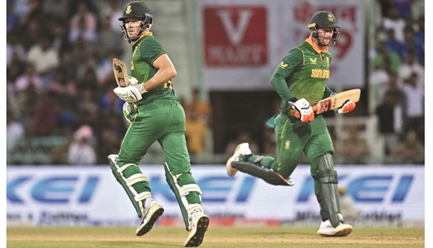 South Africau2019s Heinrich Klaasen (right) and his teammate David Miller run between the wickets during the ODI against India at the Ekana Cricket Stadium in Lucknow yesterday. (AFP) 