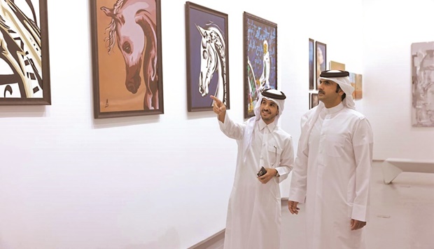 During a tour after the opening, HE the Minister was briefed on the most prominent artworks participating in the gallery, which aims to enrich the artistic world with a number of artworks, and translates the sense and creativity of the Qatari artist.
