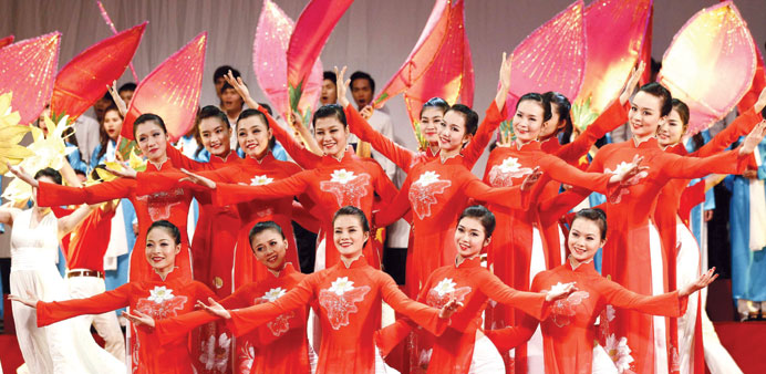 Dancers perform during the 40th anniversary celebrations of the Paris Peace Accord in Hanoi yesterday.