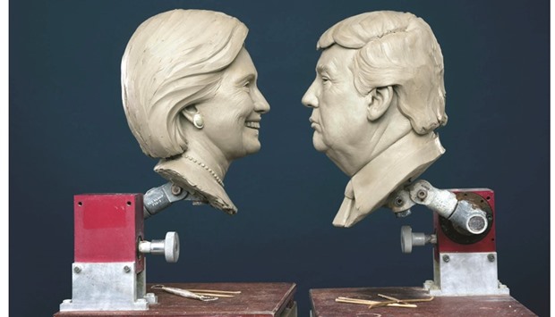 The clay models of Hillary Clinton and Donald Trump are seen in a photo handed out on behalf of Madame Tussauds.