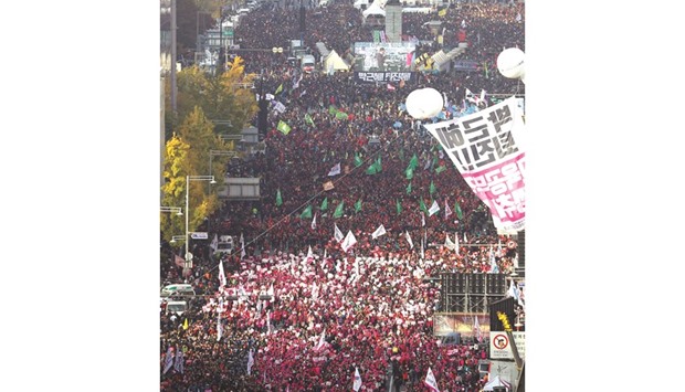Koreans gather yesterday to protest against President Park in central Seoul.