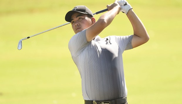 This photograph released by the Asian Tour shows Thailandu2019s Sutijet Kooratanapisan hitting a shot at the Manila event.