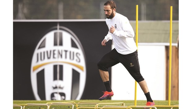 Juventusu2019 forward Gonzalo Higuain from Argentina takes part in a training session on the eve of the UEFA Champions League match against Olympique Lyonnais.