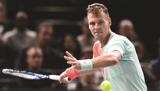 Czech Republicu2019s Tomas Berdych returns the ball during his win over Portugalu2019s Joao Sousa at the Paris Masters yesterday. (AFP)