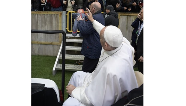Pope Francis greeting people at the Swedenbank stadium in Malmo, where the Pontiff celebrated a mass as part of his two-day visit in Sweden.