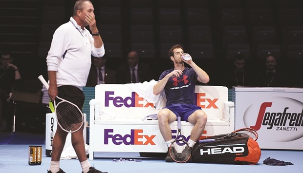 Great Britainu2019s Andy Murray with his coach Ivan Lendl during a practice session in London yesterday. At bottom, Novak Djokovic.