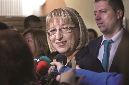 Presidential candidate of Bulgariau2019s centre-right ruling GERB party Tsetska Tsacheva talks to the media after voting at a polling station in Pleven yesterday.