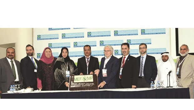 Dr Huda al-Naemi (fourth left) and other senior officials during the event.