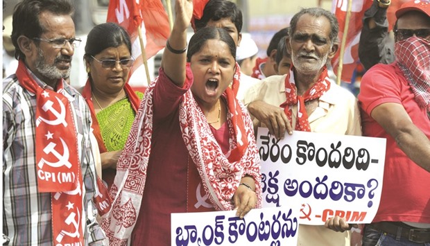 Activists from the Communist Party of India (Marxists) shout slogans during a protest against the withdrawal of Rs500 and Rs1,000 notes in Hyderabad yesterday.