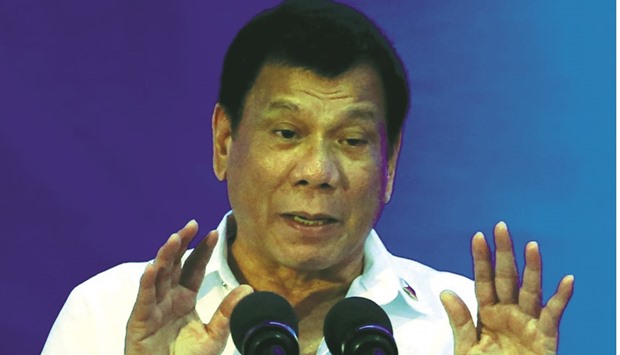 President Rodrigo Duterte gestures while delivering a speech during the 80th National Bureau of Investigation (NBI) founding anniversary at the NBI headquarters in Metro Manila yesterday.