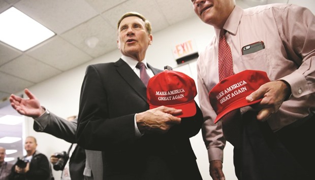 Representatives John Mica (R-FL) and Pete Sessions (R-TX) speak with reporters as they depart a house Republican caucus meeting at the US Capitol in Washington.