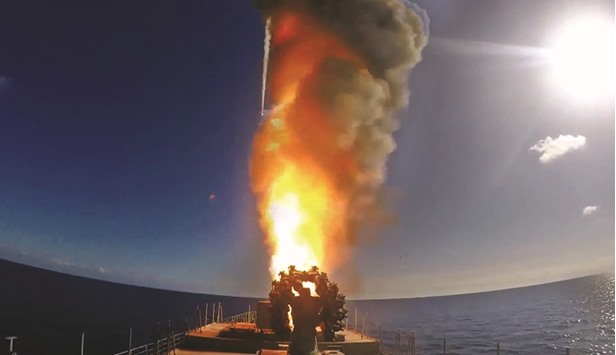 An image grab taken from a video footage made available on the Russian Defence Ministryu2019s official website yesterday, reportedly shows the frigate Admiral Grigorovich launching cruise missiles in the eastern Mediterranean off the Syrian coast during a strike against Islamic State (IS) groupu2019s positions in Syria.