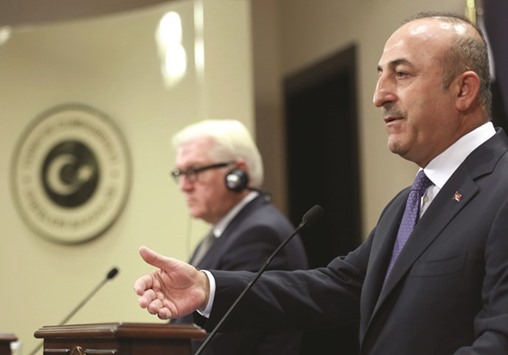 Cavusoglu and Steinmeier at the news conference following their meeting at the foreign ministry.