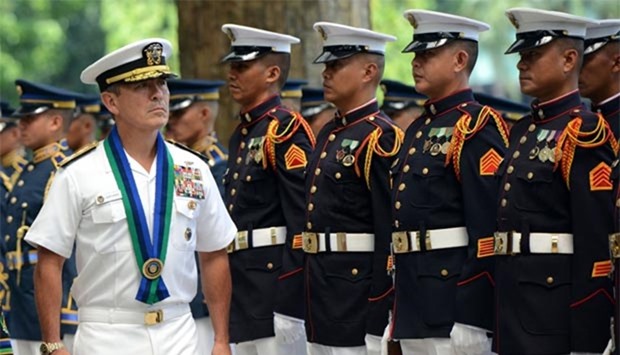 This file photo taken on August 26, 2015 shows US Pacific Command chief Admiral Harry Harris inspecting an honour guard during an arrival ceremony at the Armed Forces of the Philippines headquarters in Manila.