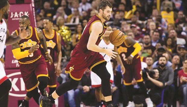 Kevin Love of the Cleveland Cavaliers drives down court during the second half against the Toronto Raptors at Quicken Loans Arena in Cleveland. (Getty Images/AFP)