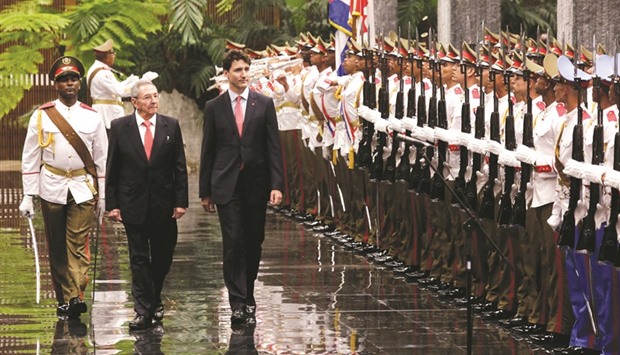 Cubau2019s President Raul Castro and Canadau2019s Prime Minister Justin Trudeau review the guard of honour during the official reception ceremony at Havanau2019s Revolution Palace, Cuba.