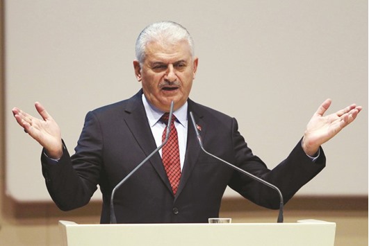 Turkish Prime Minister Binali Yildirim delivers a speech during the Justice and Development Party (AK Party) extended meeting of provincial heads at the party headquarters in Ankara.