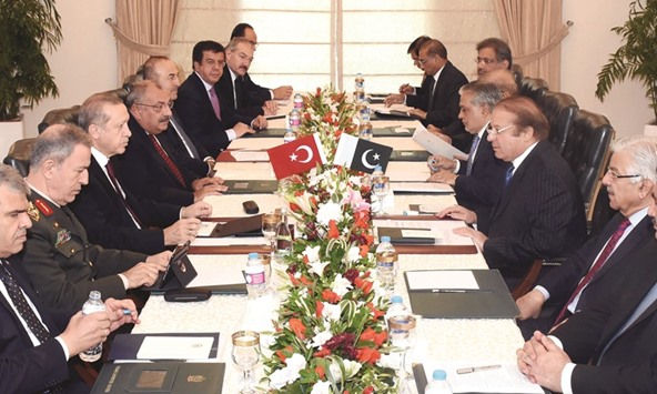 Pakistanu2019s Prime Minister Nawaz Sharif holds talks with Turkish President Recep Tayyip Erdogan during their meeting at the Prime Ministeru2019s House in Islamabad yesterday.