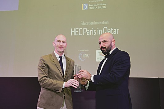 Dr Nils Plambeck receiving the award from Wissam Younane, CEO of BNC Publishing.