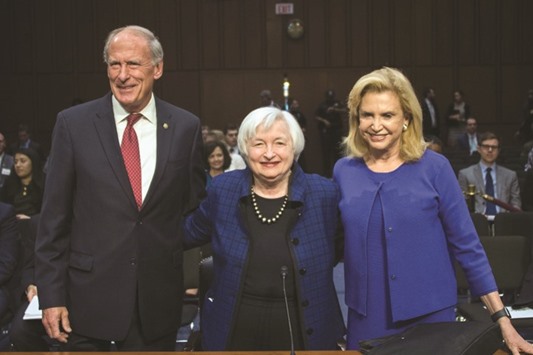 Yellen (centre) poses with chairman Dan Coats (left), R-Indiana; and Congresswoman Carolyn Maloney D-NY, before testifying before the Joint Economic Committee of Congress on Capitol Hill in Washington, DC, yesterday. In Yellenu2019s first remarks since the election of Donald Trump as the next president, the Fed chair indicated little had yet changed as a result of the November 8 outcome.