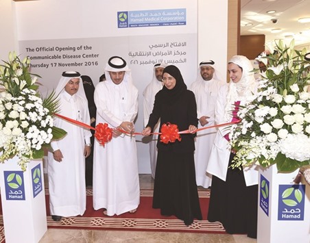 HE the Prime Minister and Interior Minister Sheikh Abdullah bin Nasser bin Khalifa al-Thani inaugurating the regionu2019s first Communicable Disease Center yesterday as HE the Minister of Public Health and HMC managing director Dr Hanan Mohamed al-Kuwari and other senior officials look on.