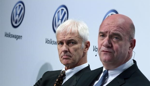 The CEO of German carmaker Volkswagen (VW) Matthias Mueller (left) and the Chairman of VW Works council Bernd Osterloh attend a press conference in Wolfsburg, northern Germany on Friday.