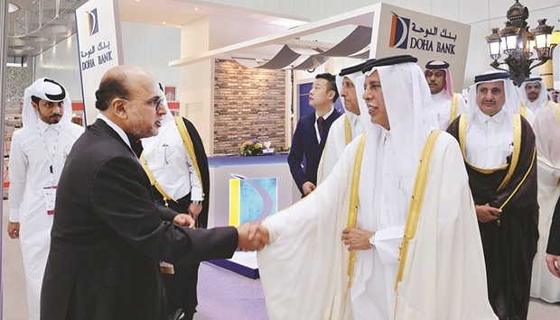 Dr R Seetharaman, Group CEO of Doha Bank, with Deputy Premier HE Ahmed bin Abdullah bin Zaid al-Mahmoud at the recently held u2018Made in Chinau2019 exhibition.