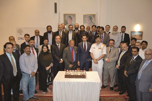 CHEERING CPEC: The get-together was attended by Pakistani Ambassador Shahzad Ahmad, PQBF members and prominent members of the expatriate community.