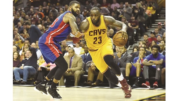 Cleveland Cavaliers LeBron James (R) drives past Detroit Pistons Marcus Morris during the second half of their NBA game. PICTURE: USA TODAY Sports