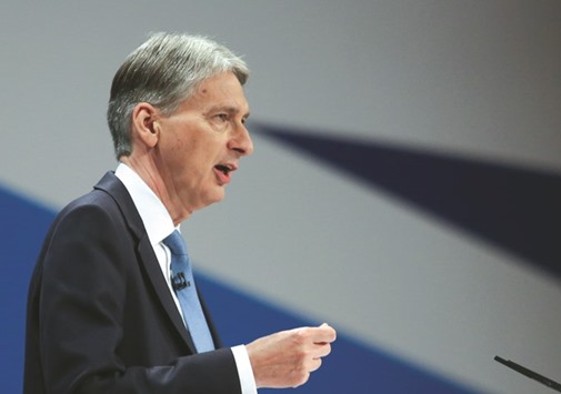 UK Chancellor of the Exchequer Philip Hammond speaking during the second day of the Conservative partyu2019s annual conference in Birmingham. Hammond is set to unveil a new fiscal framework that will let the government respond to potential economic shocks as Britain negotiates its exit from the European Union.