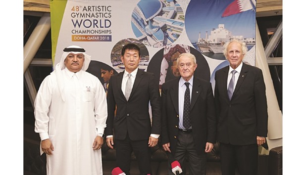 Qatar Gymnastics Federation president and International Gymnastics Federation (FIG) Executive Committee member Ali al-Hitmi (left) with newly-elected FIG president Morinari Watanabe and outgoing president Bruno Grandi (right) in Doha recently.