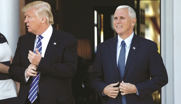 US president-elect Donald Trump and vice president-elect Mike Pence at the main clubhouse at Trump National Golf Club in Bedminster, New Jersey.