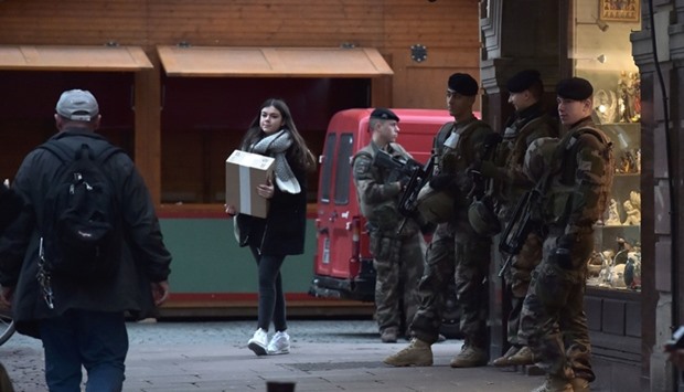 French soldiers patrol in Strasbourg's Christmas market, eastern France, on November 21, 2016 in Strasbourg