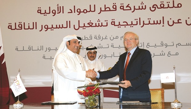 QPMC CEO Eisa al-Hammadi and Rent-A-Port general manager Marcel van Bouwel shake hands after the contract signing. PICTURE: Thajudheen