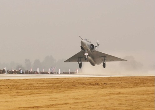 An Indian Air Force Mirage-2000 takes off from a portion of the newly-constructed Agra-Lucknow Expressway at Ganj Moradabad in Unnao district of Uttar Pradesh during a feasibility exercise yesterday. The portion of the expressway used for the exercise has been reinforced to facilitate aircraft landings to test the feasibility in case of dire emergencies or non-availability of runway for any reason.