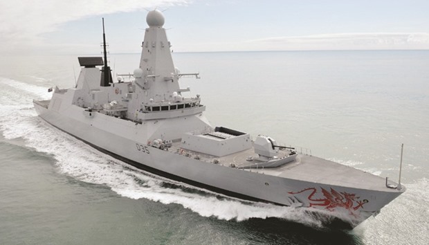 The Royal Navyu2019s latest addition to the fleet, the Type 45 destroyer HMS Dragon is pictured exercising in the English Channel.