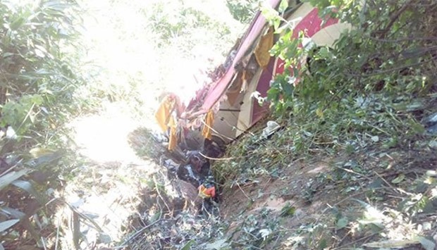 Photos of the crash site posted on social media showed the bus had come to a halt down a steep jungle ravine, its roof almost entirely sheared off.