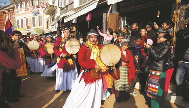 Shamans performing during the opening of Boudhanath stupa in Kathmandu, yesterday.