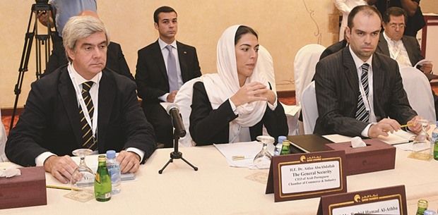 Bouabdellah (centre) during a meeting held yesterday at the Qatar Chamber headquarters.