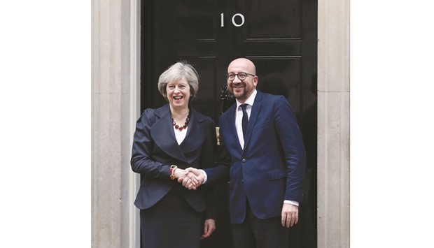 Prime Minister Theresa May shakes hands with Belgiumu2019s Prime Minister Charles Michel outside 10 Downing Street in London yesterday.