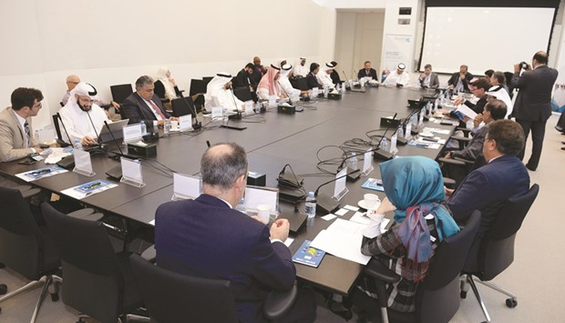 Officials from various Islamic finance organisations at the  roundtable hosted by HBKU yesterday.