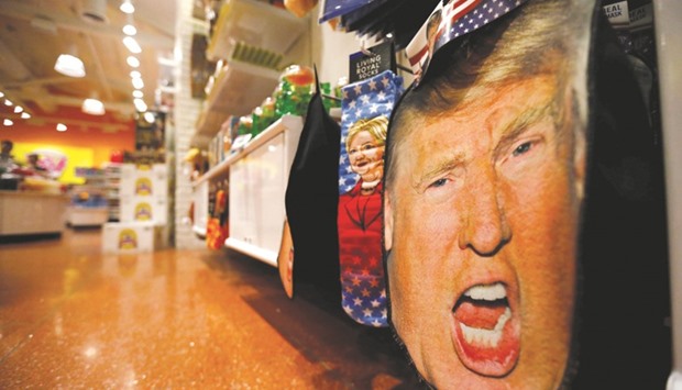 A mask depicting Republican presidential candidate Donald Trump being displayed at a shop in Pasadena, California. The author Sam Harris recently said heu2019d prefer that the presidency went to an American picked at random rather than Trump.