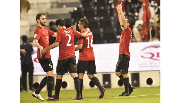 Rodrigo Tabata (R) celebrates Al Rayyanu2019s win yesterday.