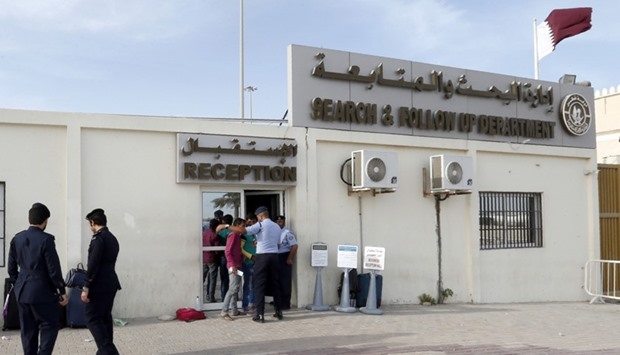 Migrants arrive at the Search and Follow up Department, which is processing the claims of those trying to leave as part of an ongoing three-month amnesty for undocumented residents, on November 8, 2016 in Doha