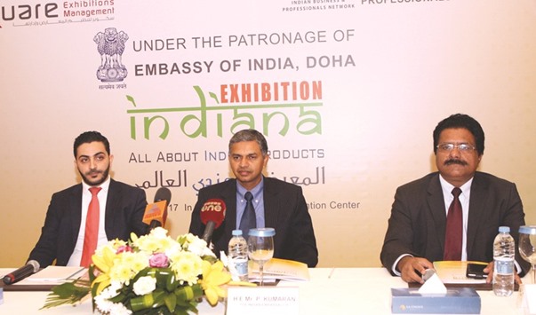 Kumaran (centre) and Varghese (right) unveil u201cIndianau201d at a press conference in Doha yesterday.