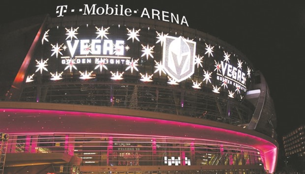 The team name and logo for the Vegas Golden Knights are displayed on T-Mobile Arenau2019s video mesh wall after being announced as the name for the Las Vegas NHL franchise in Las Vegas. The team will begin play in the 2017-18 season. (Getty Images/AFP)