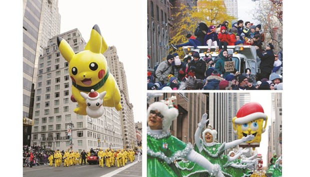 Left: The Pikachu balloon floats down Central Park West during the parade.  Top right: A man is seen holding a placard at a sand-filled dump truck being used by others as a viewing stand during the 90th annual Macyu2019s Thanksgiving Day Parade in New York.  Below right: The Tap Dancing Christmas Trees perform on 6th Avenue during the parade.